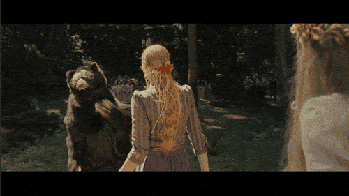 Nicolas Cage punching a woman dressed as a bear